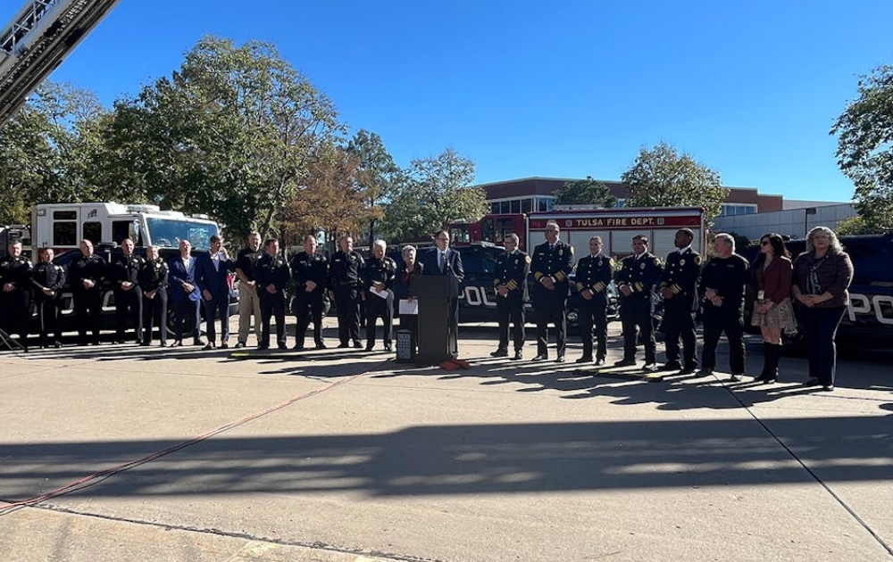 G. T. Bynum presents the new city of Tulsa Public Safety Center with emergency services personnel